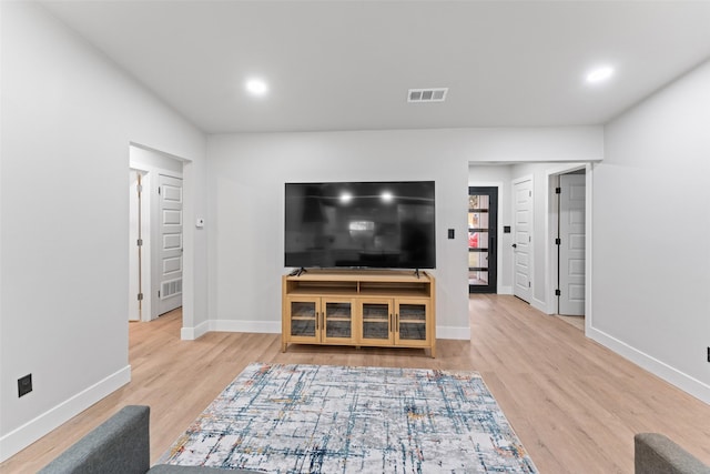 living room with wood-type flooring