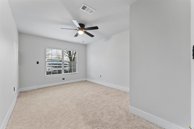 unfurnished room with carpet floors and ceiling fan