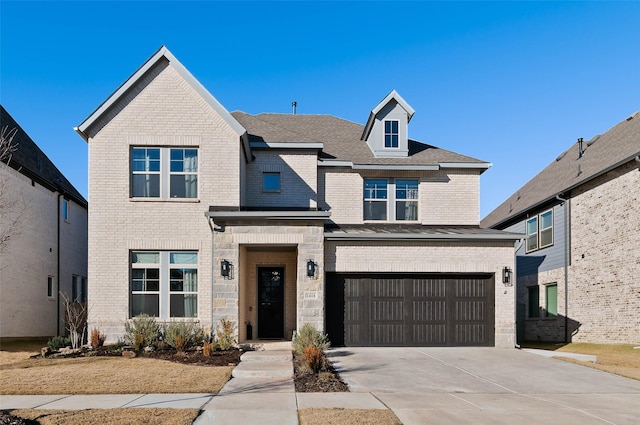 view of front of property featuring a garage