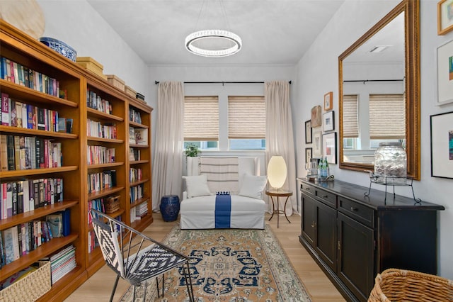 living area featuring light hardwood / wood-style floors