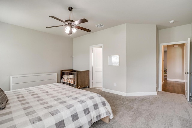 bedroom with light colored carpet and ceiling fan