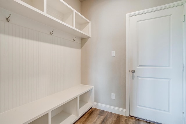 mudroom with dark wood-type flooring