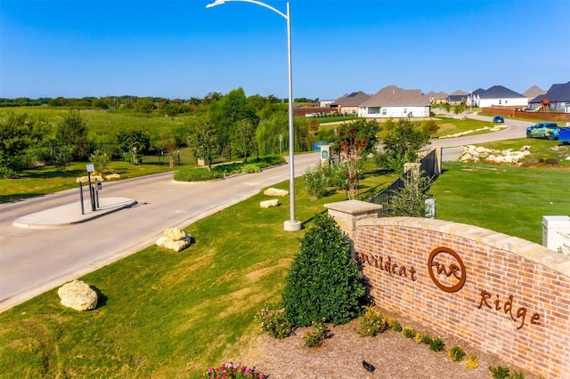 view of community with a yard