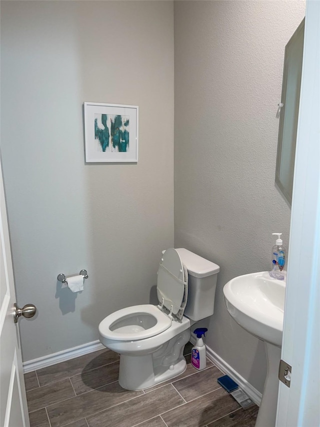 bathroom featuring toilet