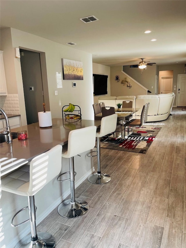 dining space with ceiling fan