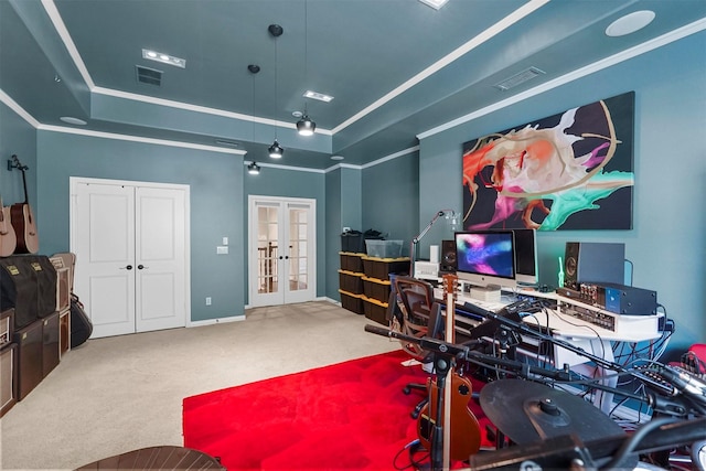 carpeted home office featuring a raised ceiling and french doors