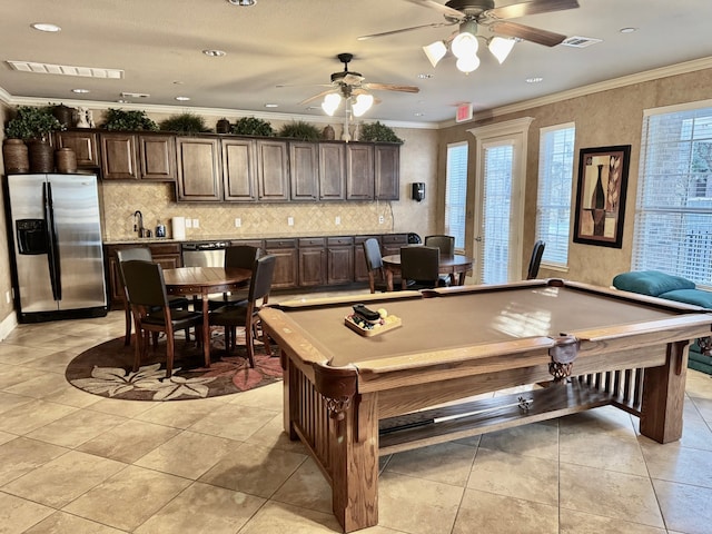 playroom with pool table, ceiling fan, crown molding, and light tile patterned floors