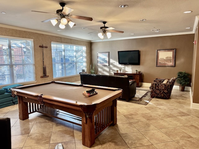 recreation room with pool table, ceiling fan, light tile patterned floors, and ornamental molding