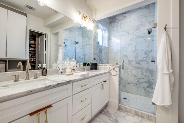 bathroom with vanity and walk in shower