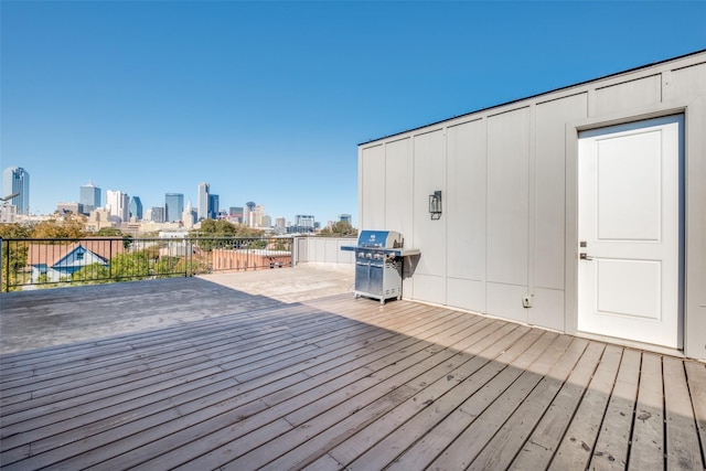 wooden deck with grilling area