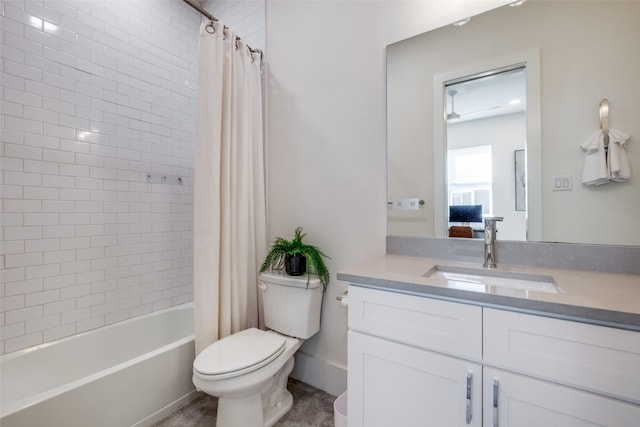 full bathroom featuring toilet, vanity, and shower / bath combo with shower curtain