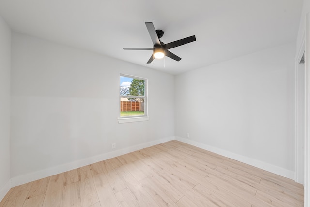 spare room featuring ceiling fan and light hardwood / wood-style flooring