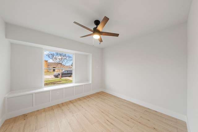 unfurnished room featuring ceiling fan and light hardwood / wood-style floors