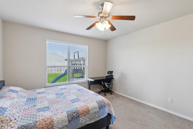 bedroom featuring light carpet and ceiling fan