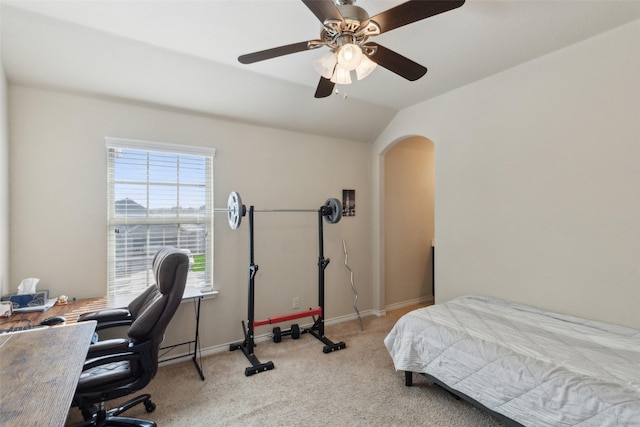 carpeted bedroom with ceiling fan and lofted ceiling