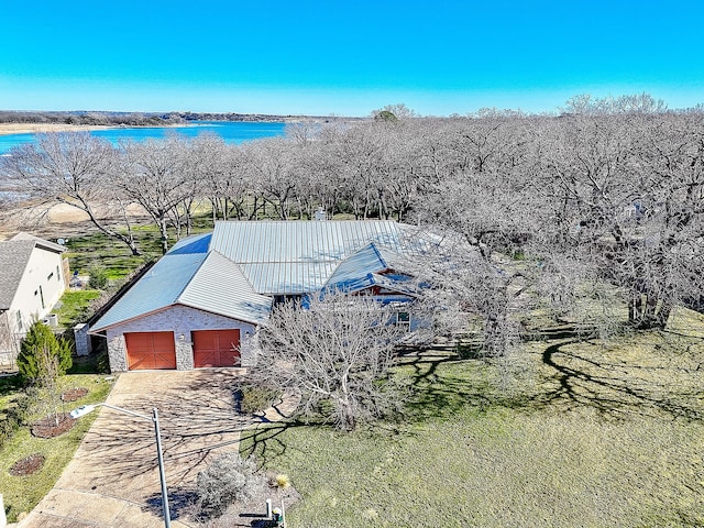 drone / aerial view featuring a water view