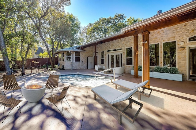 view of swimming pool with a patio