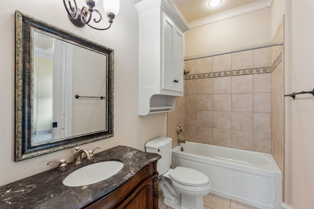 full bathroom featuring tile patterned flooring, toilet, crown molding, vanity, and tiled shower / bath