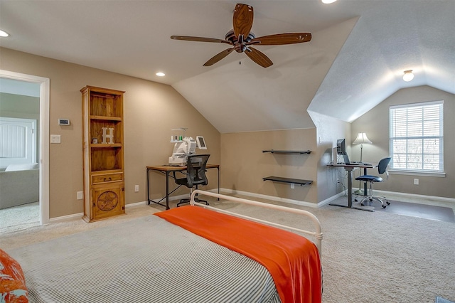 carpeted bedroom featuring vaulted ceiling and ceiling fan