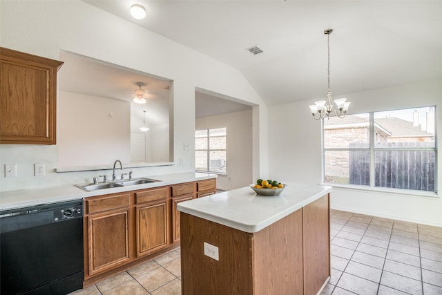 kitchen with dishwasher, a kitchen island, sink, a chandelier, and light tile patterned floors