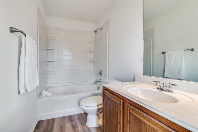 full bathroom featuring toilet, vanity, shower / bathtub combination, and hardwood / wood-style floors