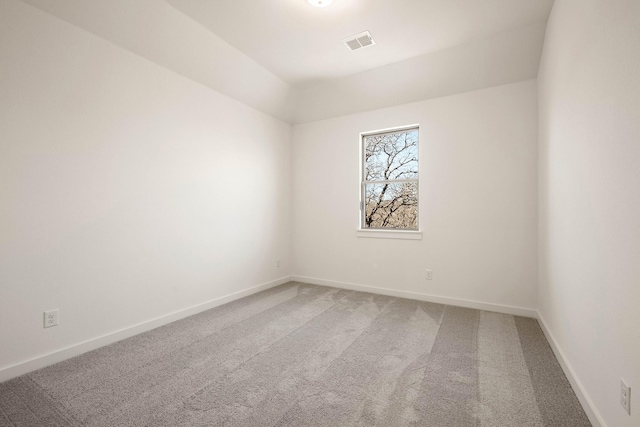 unfurnished room with carpet flooring