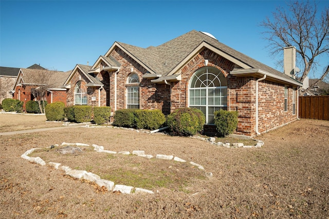 view of front of property with a front lawn