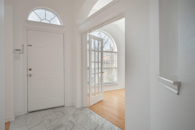 entryway with vaulted ceiling