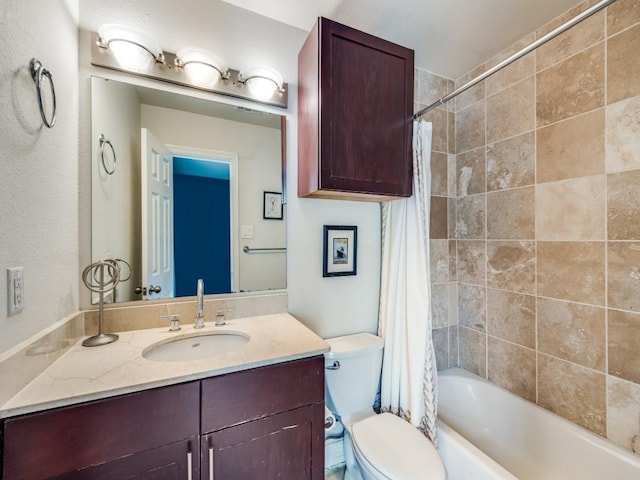 full bathroom featuring toilet, shower / bathtub combination with curtain, and vanity