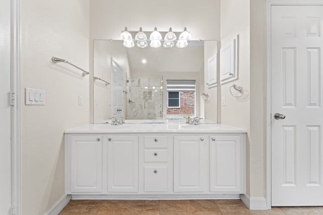 bathroom featuring vanity, walk in shower, and tile patterned floors