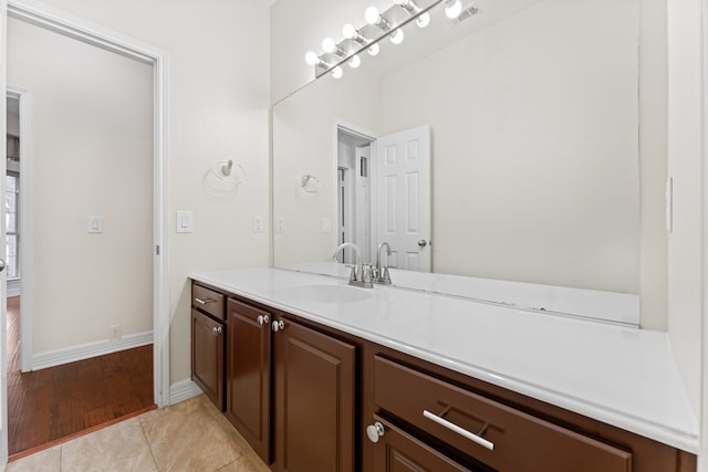 bathroom featuring vanity and tile patterned floors