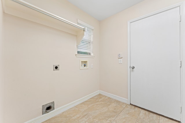 clothes washing area featuring electric dryer hookup, light tile patterned flooring, and washer hookup