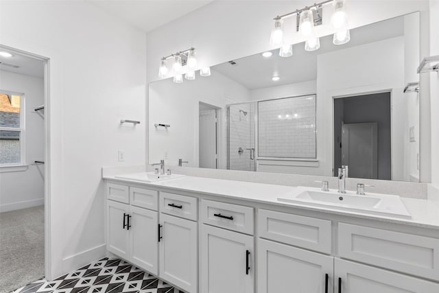 bathroom with vanity and walk in shower