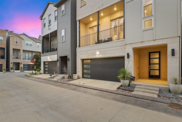 view of front of property featuring a garage