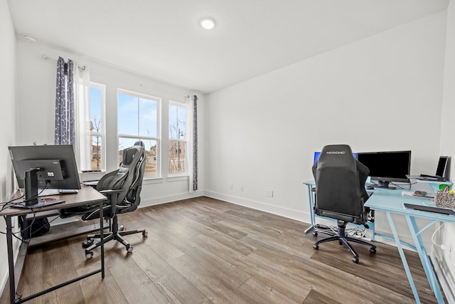 office space with hardwood / wood-style floors