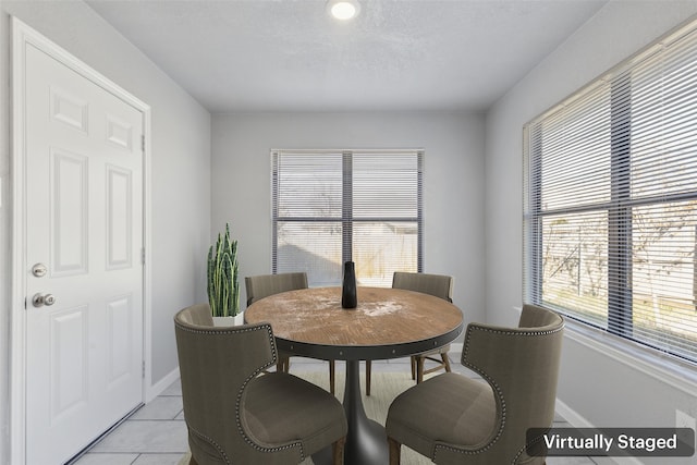 view of tiled dining space