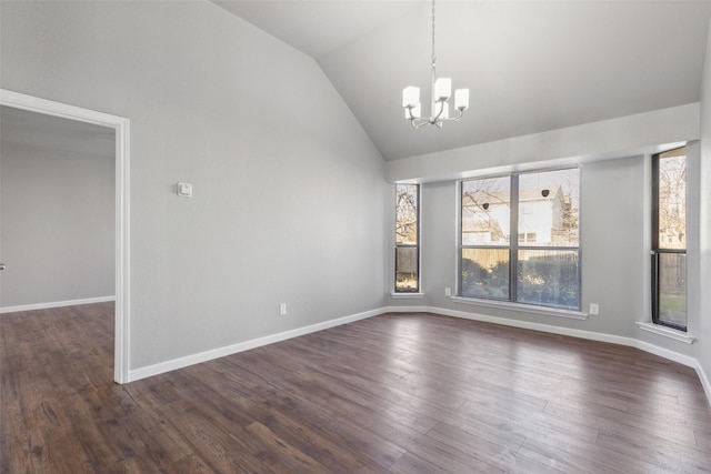 unfurnished dining area with dark hardwood / wood-style flooring, an inviting chandelier, and lofted ceiling