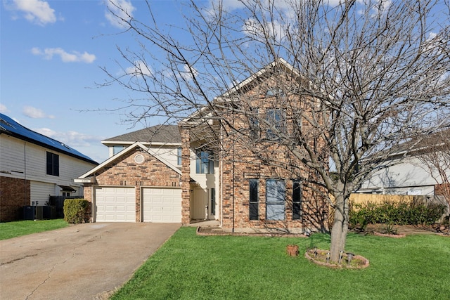 front facade featuring a front yard, a garage, and central air condition unit