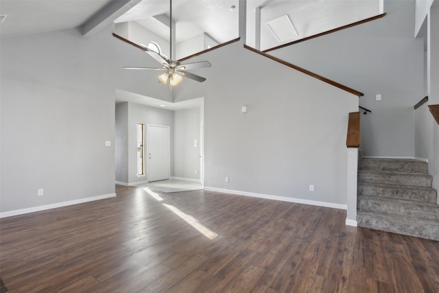 unfurnished living room featuring ceiling fan, dark wood-type flooring, high vaulted ceiling, and beam ceiling