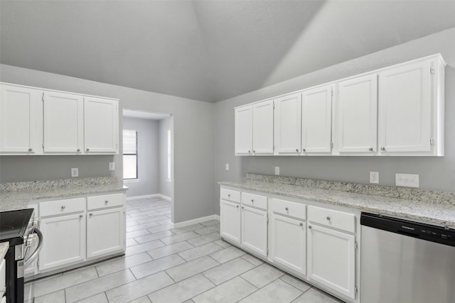 kitchen featuring stainless steel appliances, light tile patterned floors, light stone countertops, and white cabinets