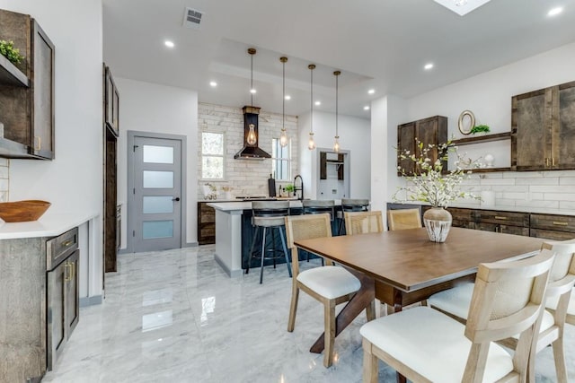 dining space with sink