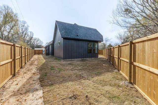 rear view of house with cooling unit