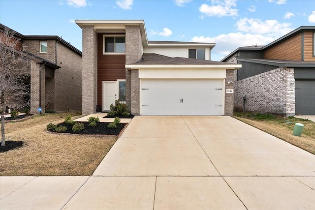 view of front of property with a garage