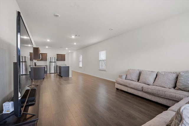 living room featuring dark hardwood / wood-style floors