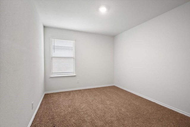 spare room with carpet flooring