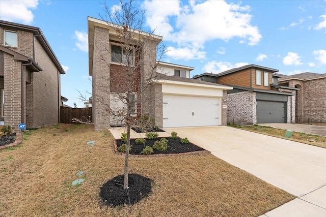 view of front of home with a garage and a front yard