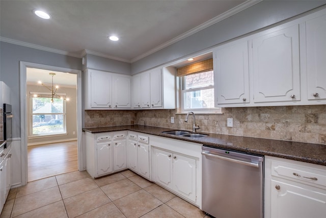 kitchen featuring white cabinetry, dishwasher, light tile patterned floors, and sink