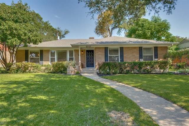 ranch-style house with a front yard