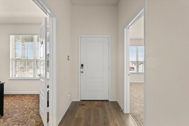 interior space featuring carpet floors and plenty of natural light