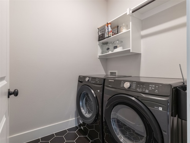 washroom with separate washer and dryer